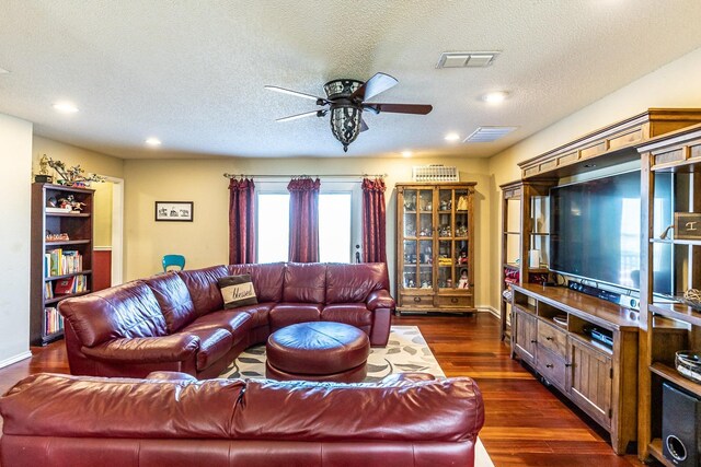 4306 Alcove Ave, Lubbock, TX 79407 - living room featuring ceiling fan, recessed lighting, visible vents, and dark wood-type flooring