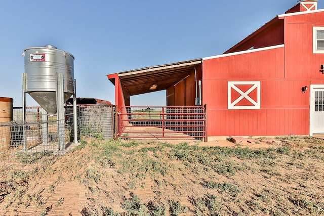 4306 Alcove Ave, Lubbock, TX 79407 - view of outbuilding with fence and an outbuilding