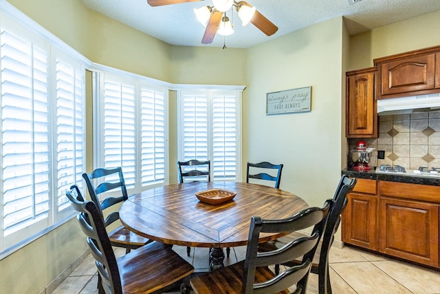 4306 Alcove Ave, Lubbock, TX 79407 - dining area featuring light tile patterned flooring and a healthy amount of sunlight