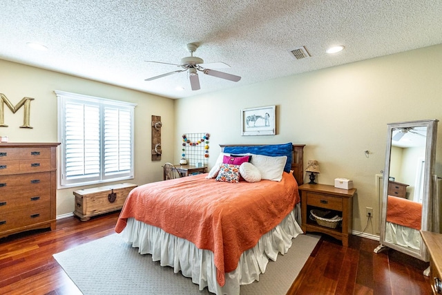 4306 Alcove Ave, Lubbock, TX 79407 - bedroom with a textured ceiling, visible vents, wood finished floors, and baseboards