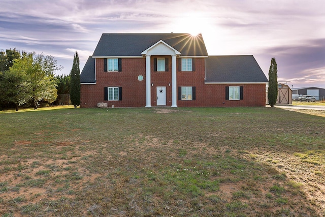 4306 Alcove Ave, Lubbock, TX 79407 - greek revival house featuring brick siding and a front yard