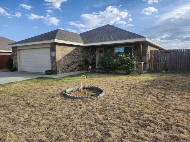 ranch-style house with a garage and a front lawn