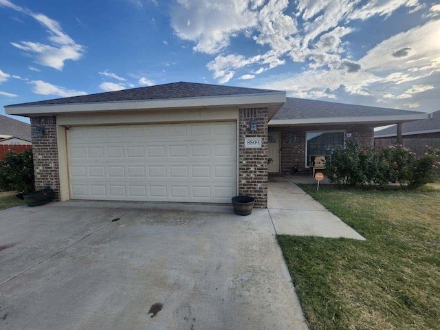 ranch-style home featuring a garage