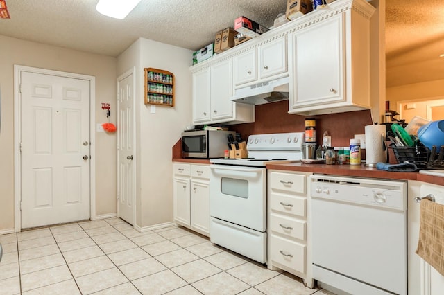 kitchen with white cabinetry, white appliances, a textured ceiling, and light tile patterned floors