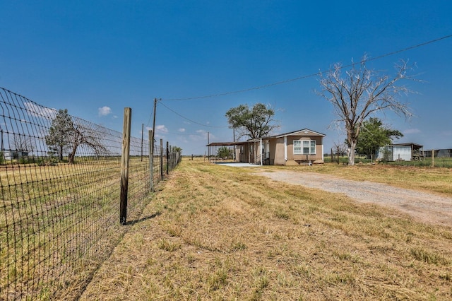 view of yard featuring a carport