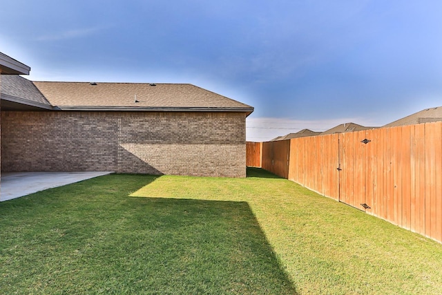 9610 Kline Ave, Lubbock, TX 79424 - view of yard featuring a fenced backyard and a patio area