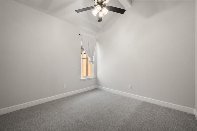 carpeted empty room with lofted ceiling and ceiling fan