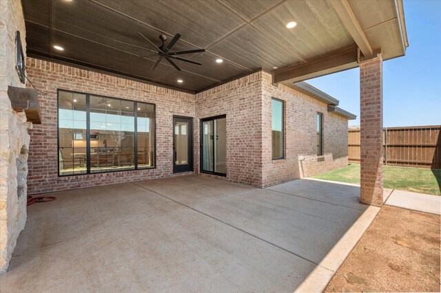 view of patio / terrace featuring ceiling fan