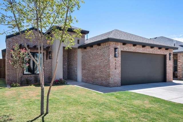 view of front of house featuring a garage and a front lawn