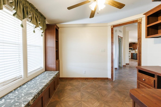 mudroom featuring ceiling fan and dark parquet floors