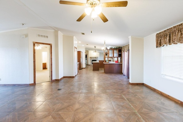 unfurnished living room featuring parquet floors, crown molding, and ceiling fan