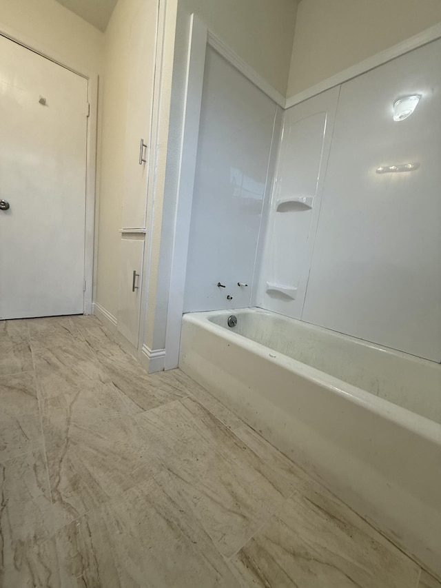 full bathroom featuring a tub to relax in