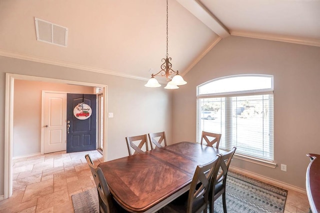 dining space with lofted ceiling with beams and crown molding