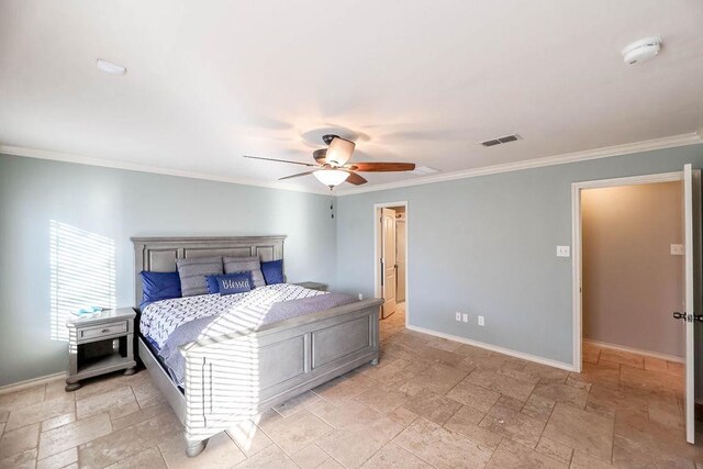 bedroom with ceiling fan and ornamental molding