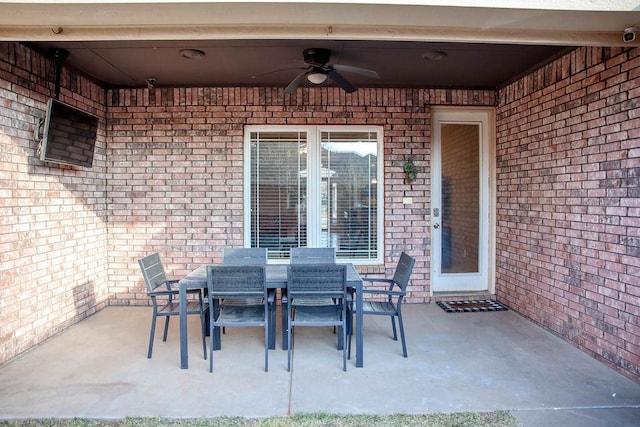 view of patio featuring ceiling fan