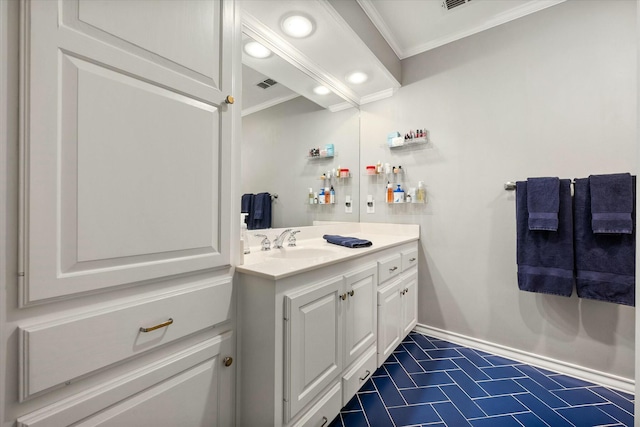 9214 York Pl, Lubbock, TX 79424 - bathroom featuring vanity, ornamental molding, tile patterned flooring, visible vents, and recessed lighting