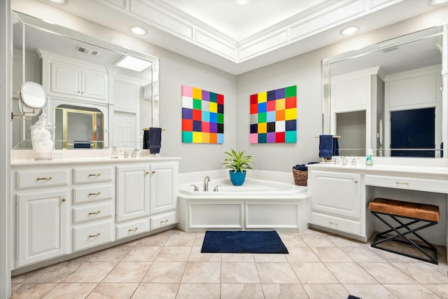 9214 York Pl, Lubbock, TX 79424 - bathroom featuring vanity, tile patterned flooring, a bath, and visible vents