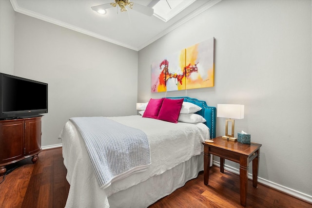 9214 York Pl, Lubbock, TX 79424 - bedroom featuring crown molding, baseboards, ceiling fan, and wood finished floors