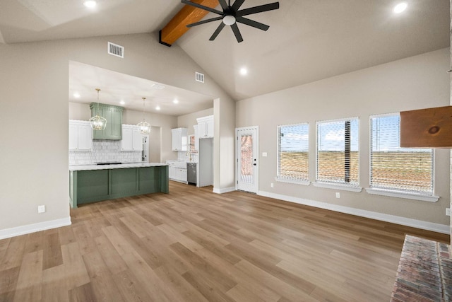 unfurnished living room with ceiling fan with notable chandelier, light hardwood / wood-style flooring, high vaulted ceiling, and beamed ceiling