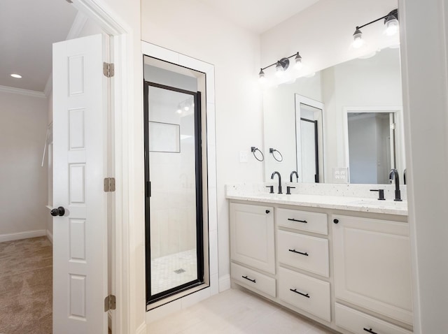 bathroom with crown molding, vanity, an enclosed shower, and tile patterned flooring