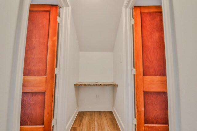 stairway featuring hardwood / wood-style flooring