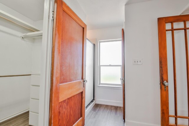 hallway featuring dark wood-type flooring