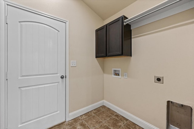 laundry room featuring cabinets, hookup for an electric dryer, and washer hookup