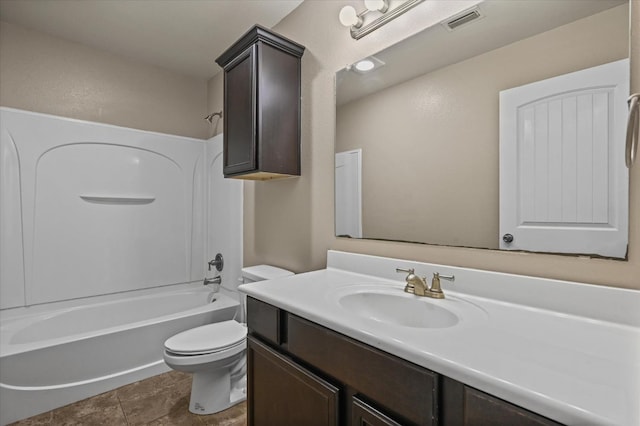 full bathroom with vanity, tile patterned flooring, bathing tub / shower combination, and toilet