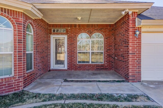 entrance to property with a garage