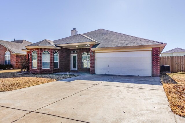 ranch-style home featuring a garage