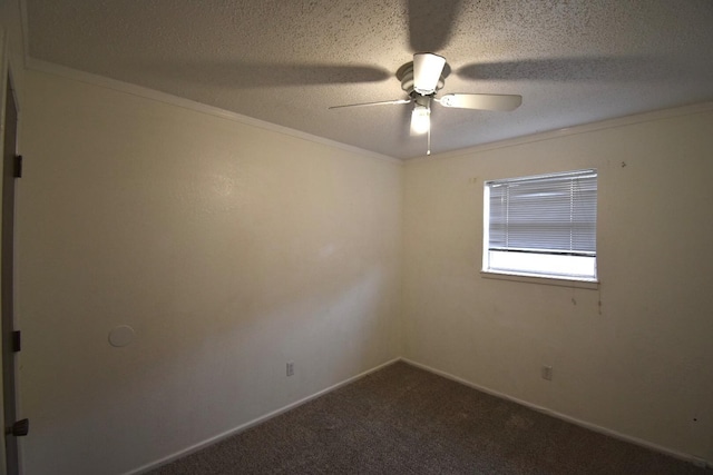 empty room with ornamental molding, carpet, a textured ceiling, and ceiling fan