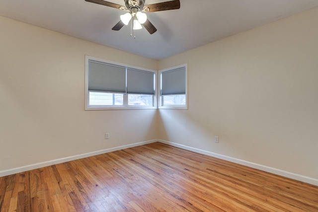 spare room featuring ceiling fan and light wood-type flooring