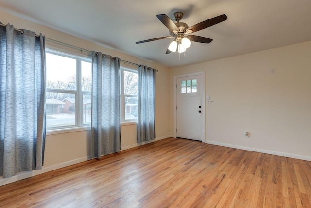 interior space featuring light hardwood / wood-style flooring and ceiling fan