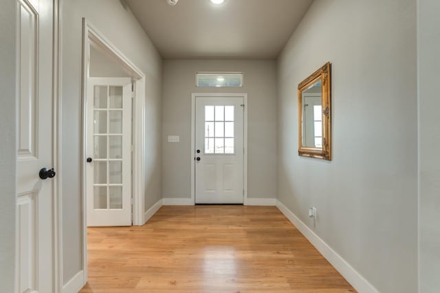 entryway with light wood-type flooring