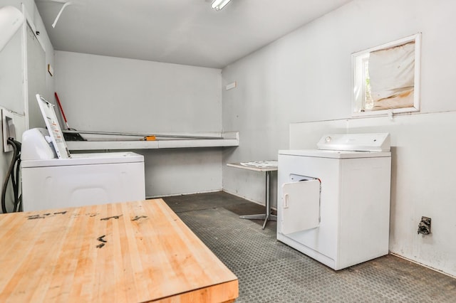 laundry room with separate washer and dryer