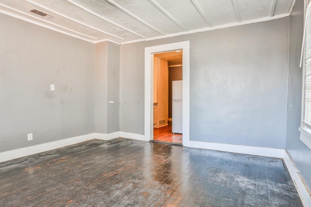 unfurnished room featuring hardwood / wood-style floors