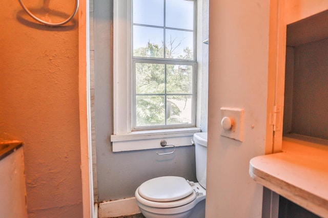 bathroom featuring toilet