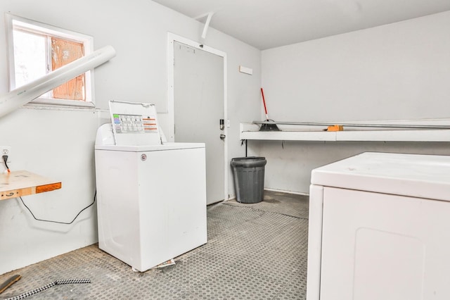 laundry room with washing machine and dryer