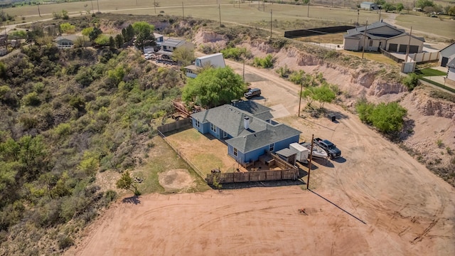 birds eye view of property featuring a rural view