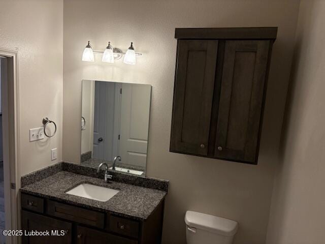2612 136th St, Lubbock, TX 79423 - bathroom featuring vanity and toilet