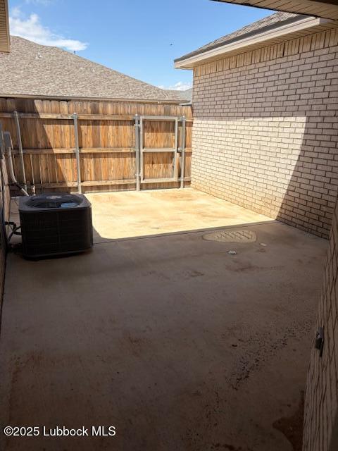 2612 136th St, Lubbock, TX 79423 - view of patio / terrace with central AC