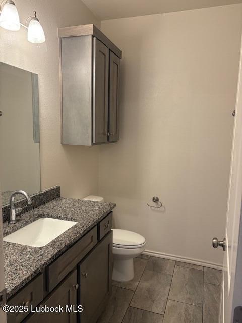 2612 136th St, Lubbock, TX 79423 - bathroom with vanity and toilet