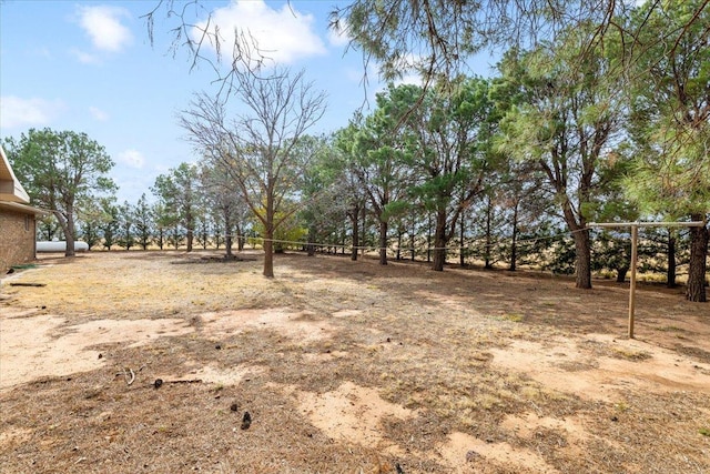 view of yard with a rural view