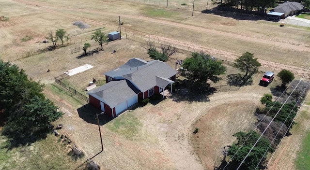 birds eye view of property featuring a rural view