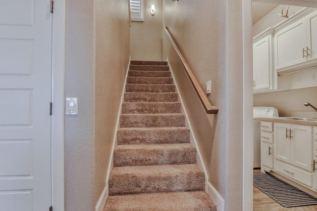 staircase with sink