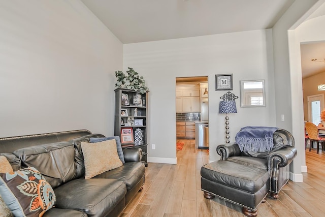 living room with light hardwood / wood-style flooring