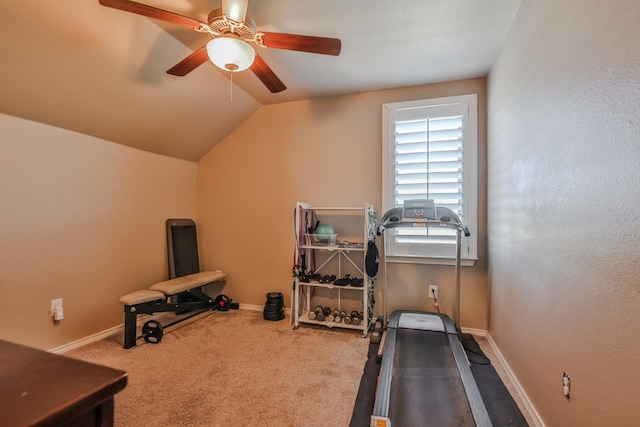 exercise area featuring lofted ceiling, carpet flooring, and ceiling fan