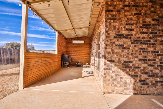 view of patio with fence