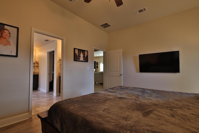 bedroom featuring visible vents, baseboards, and ceiling fan