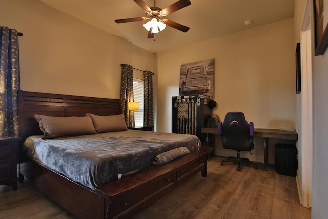 bedroom featuring a ceiling fan and wood finished floors